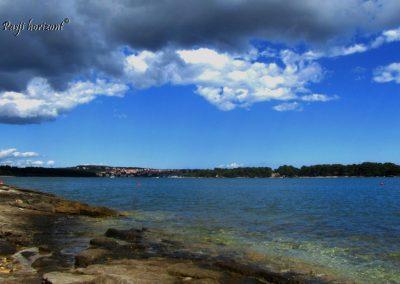 Premantura, obala in oblaki